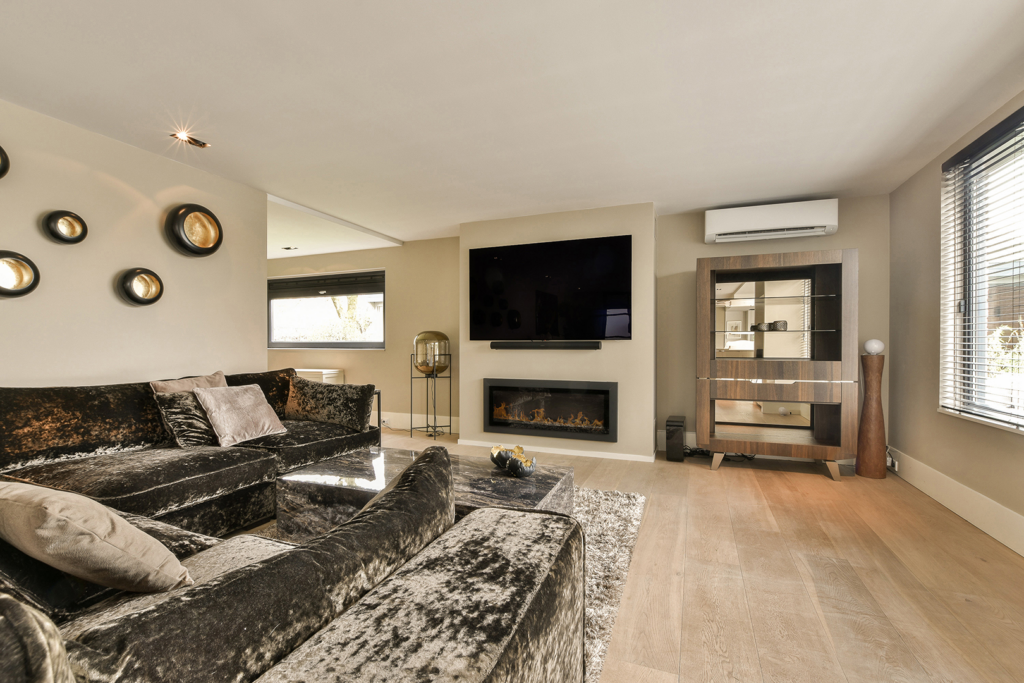 Living room with media wall and electric fire